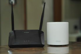 a couple of routers sitting on top of a table